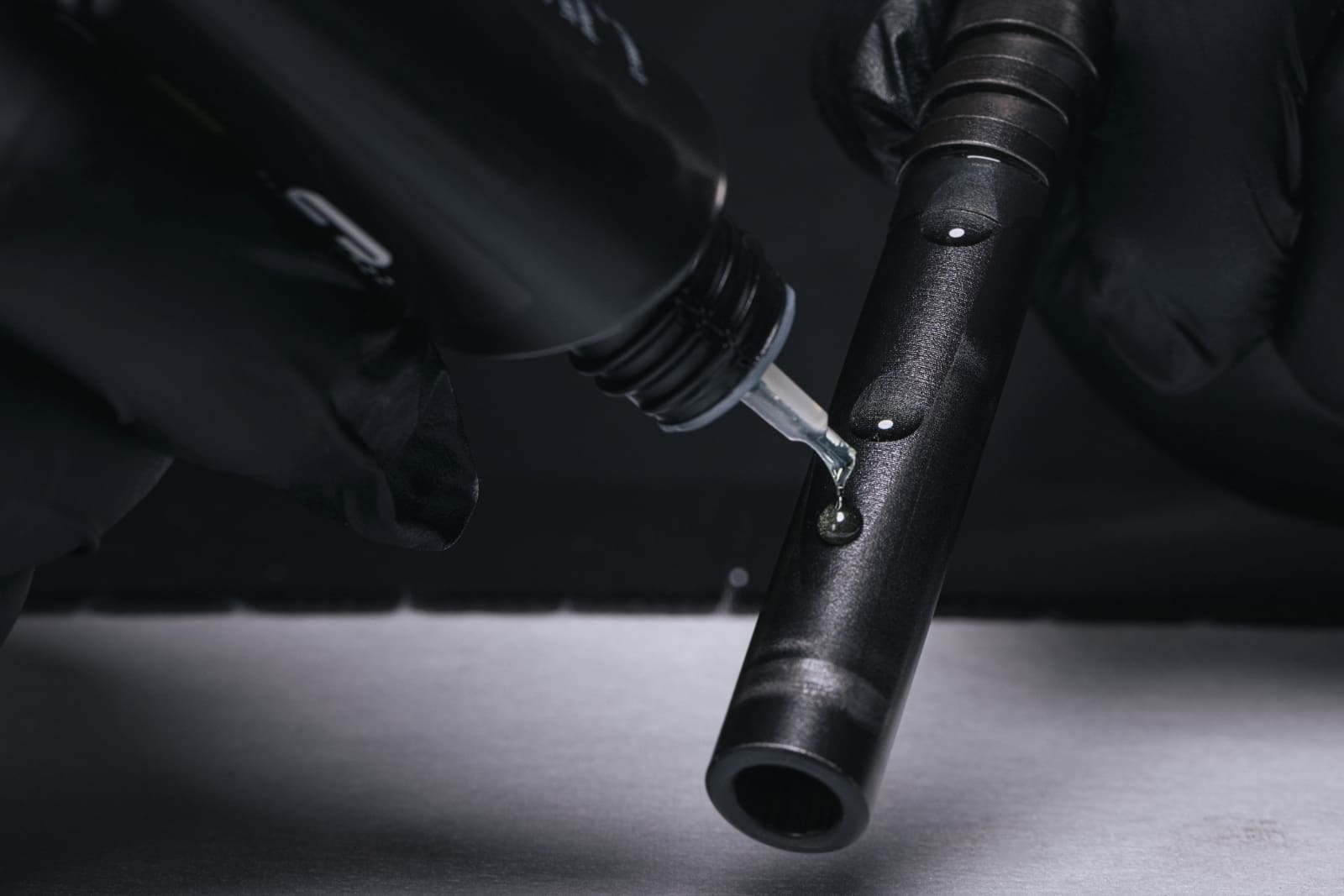 Lubricating firearm components with RifleCX CLP Oil